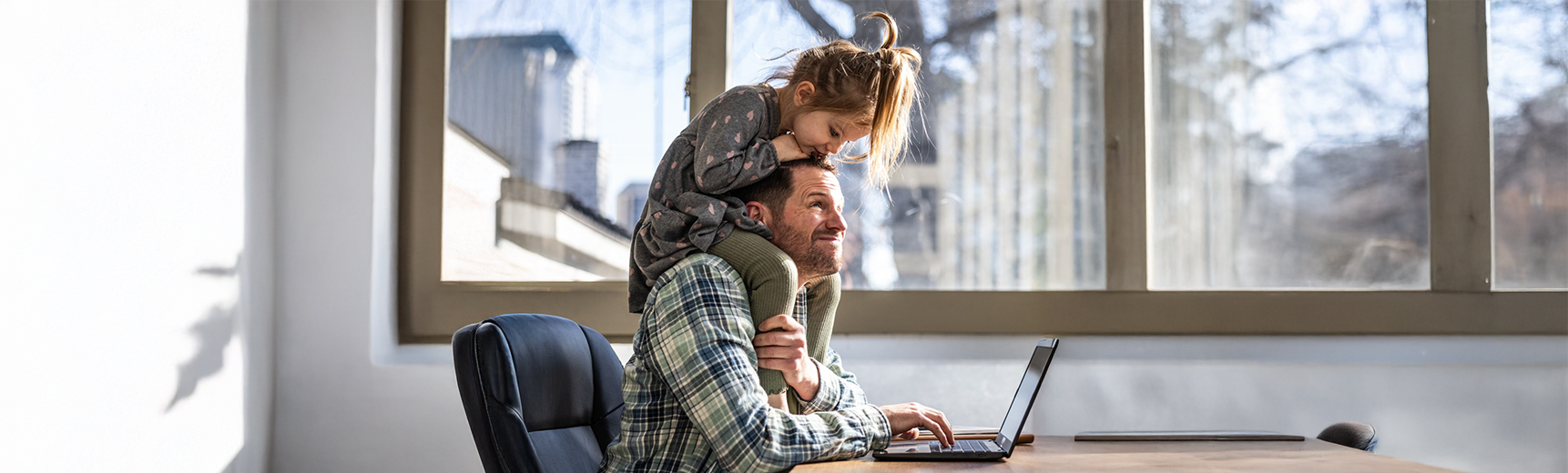 Father and Daughter while working from home