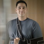 Man with arm in sling