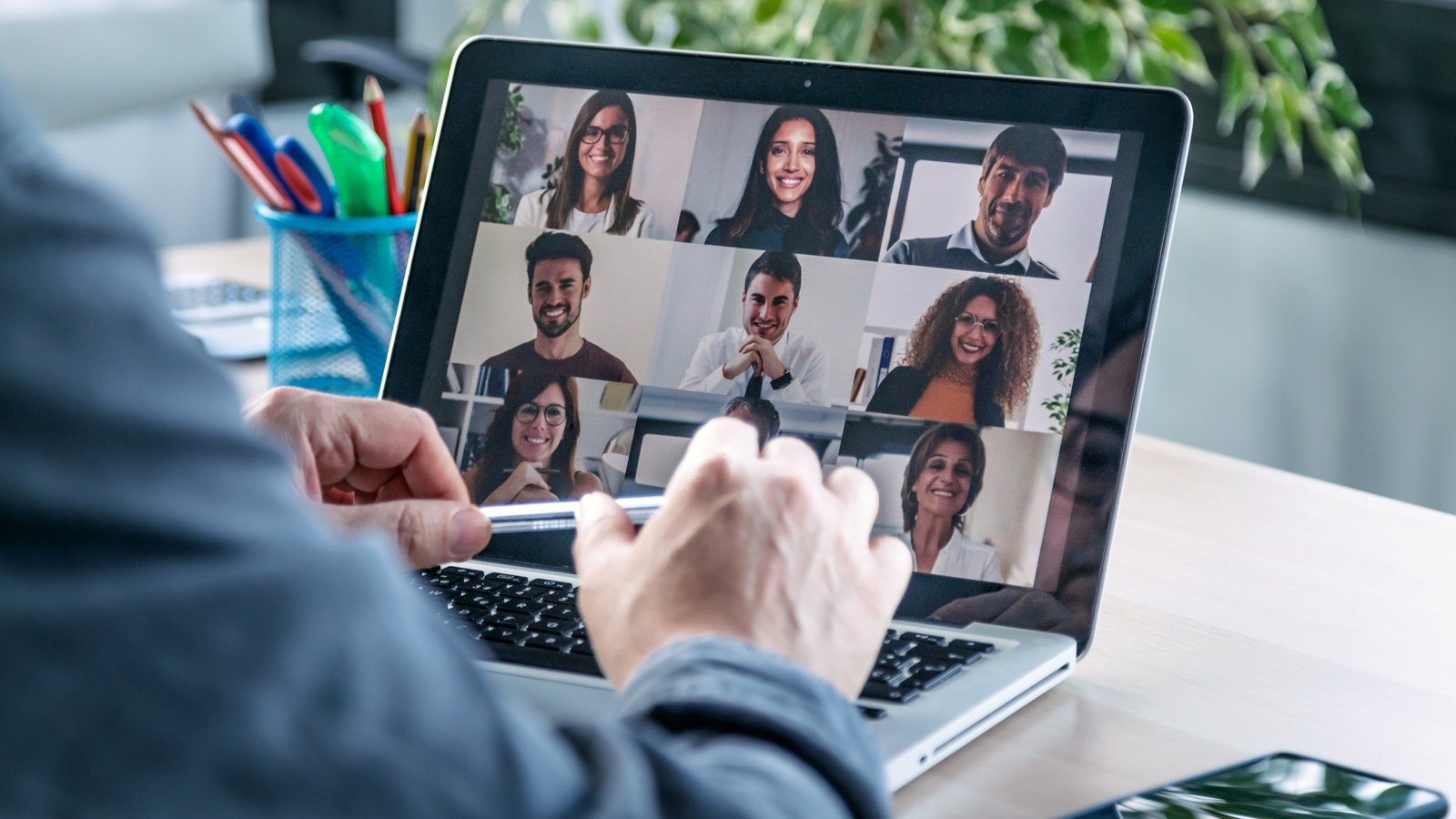 A conference video call on a tablet