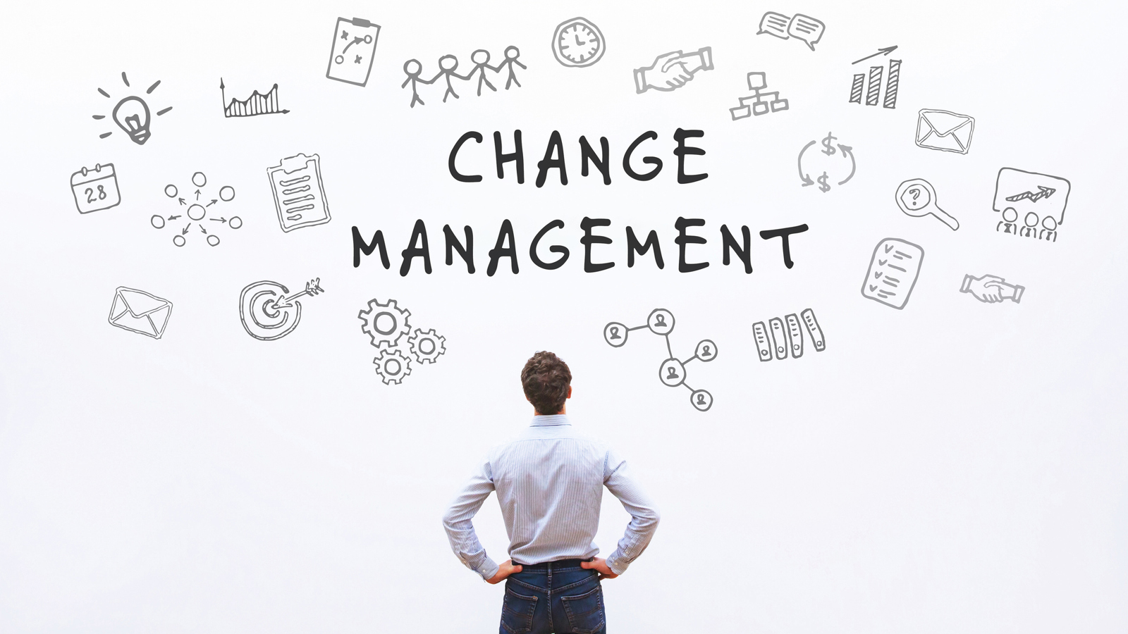 A man looks at a change management board