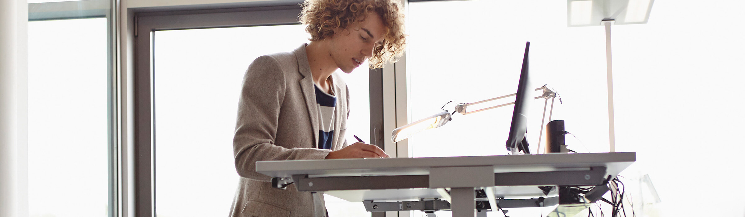 A man works at his desk