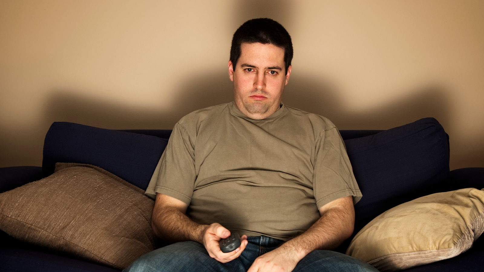 A man watching TV